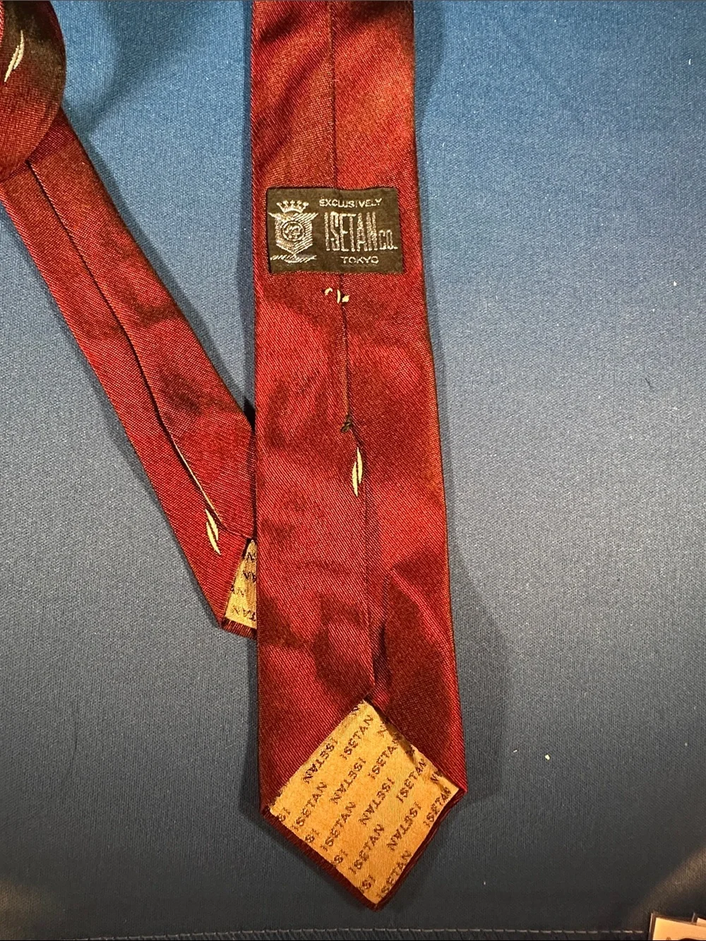 Isetan Co. Men's Burgundy Silk Tie with Subtle Gold Stitch Accent